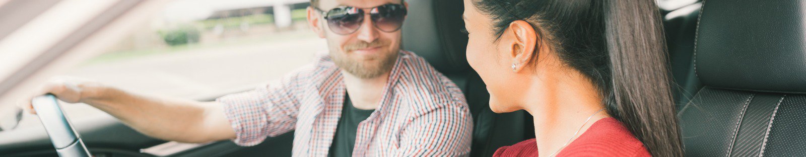 couple traveling together by car using gps navigation